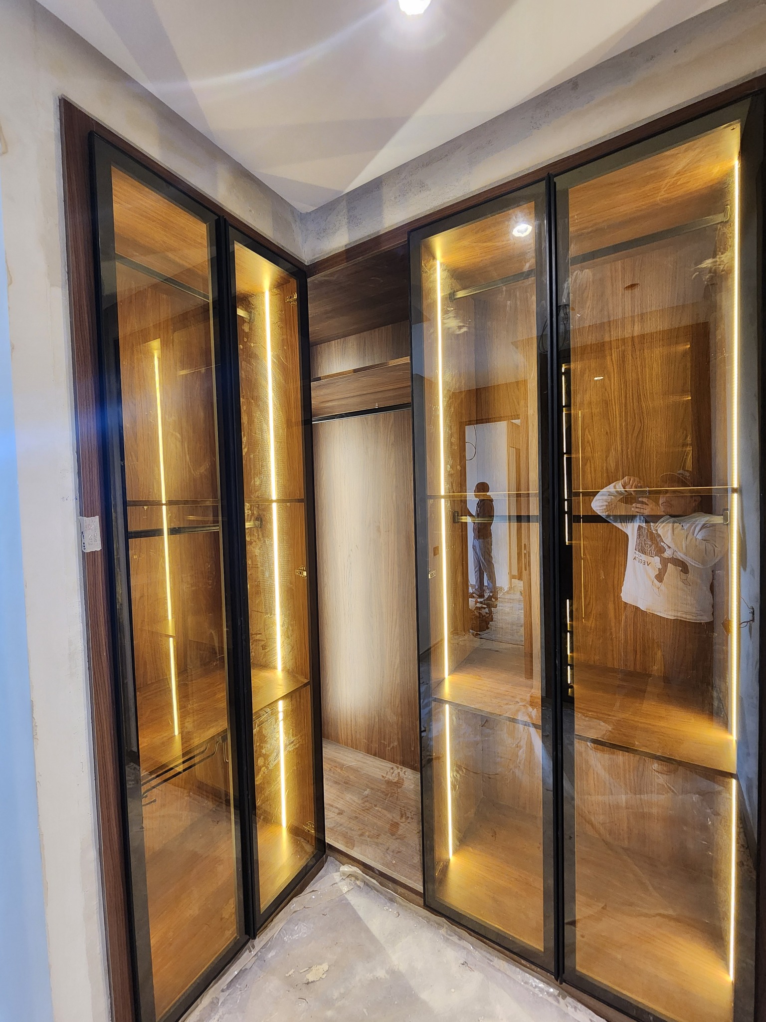 Dressing d’angle avec portes vitrées